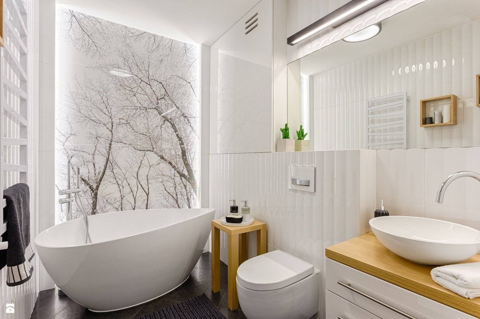 Коврики, дерево, много света – оформляем ванную в скандинавском стиле (10 фото)